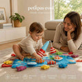 Jeu de pêche éducatif en tissu Montessori PetitPas Éveil, avec poissons colorés pour apprendre à pêcher.